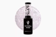 Jasnoliliowa próbka koloru z opalizującymi płatkami przy butelce lakieru hybrydowego 478 Cosmopolitan 8 ml