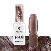 Lakier hybrydowy Victoria Vynn Pure Vegan Creamy Hybrid No.283 Brown Spell 8ml - butelka obok paznokietnika w odcieniu jasny brąz z efektem cat eye