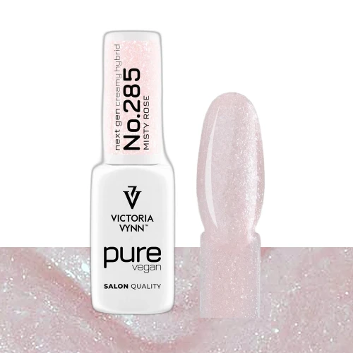 Lakier hybrydowy Victoria Vynn Pure Vegan Creamy Hybrid No.285 Misty Rose 8ml - butelka obok paznokietnika w odcieniu półtransparentny mleczny róż z kawałkami folii