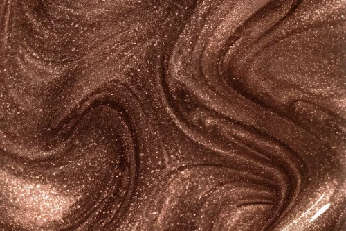 Tekstura lakieru hybrydowego Victoria Vynn 485 Cat Eye Rosewood 8 ml, brąz z różowozłotymi drobinkami magnetycznymi